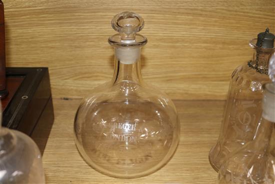 A quantity of glass decanters tallest 31cm